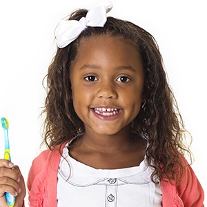 child with toothbrush