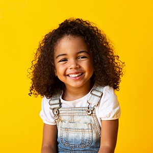Smiling young girl with beautiful teeth