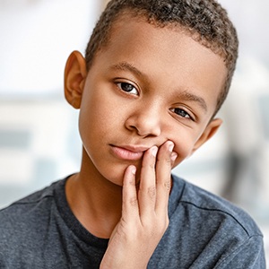 little boy with children’s dental emergency in Naperville