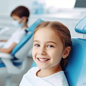 Little girl smiling before tooth extraction in Naperville