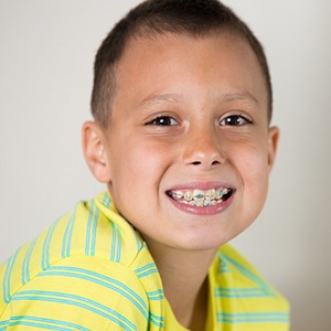 young boy with braces