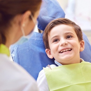 boy sitting in dental chair about to get dental sealants in Naperville