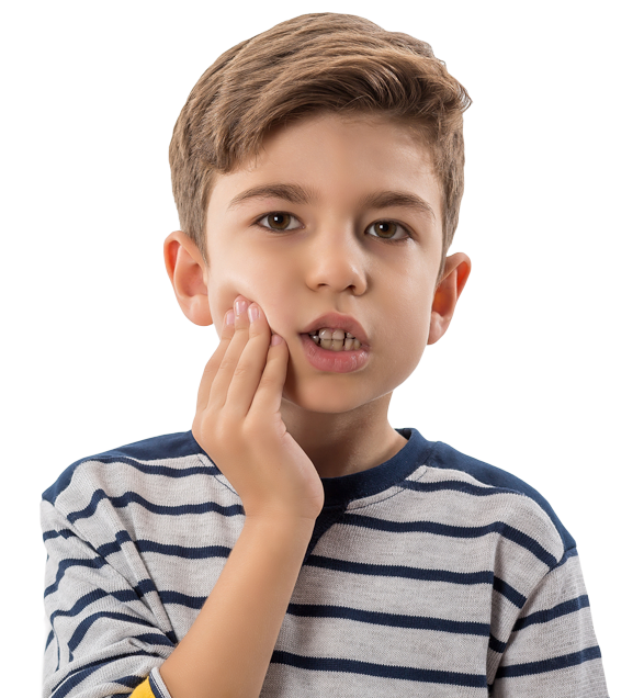 Young boy holding cheek in pain