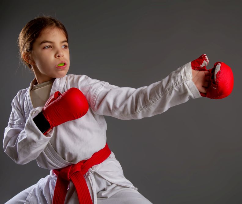 A girl wearing a sports mouthguard